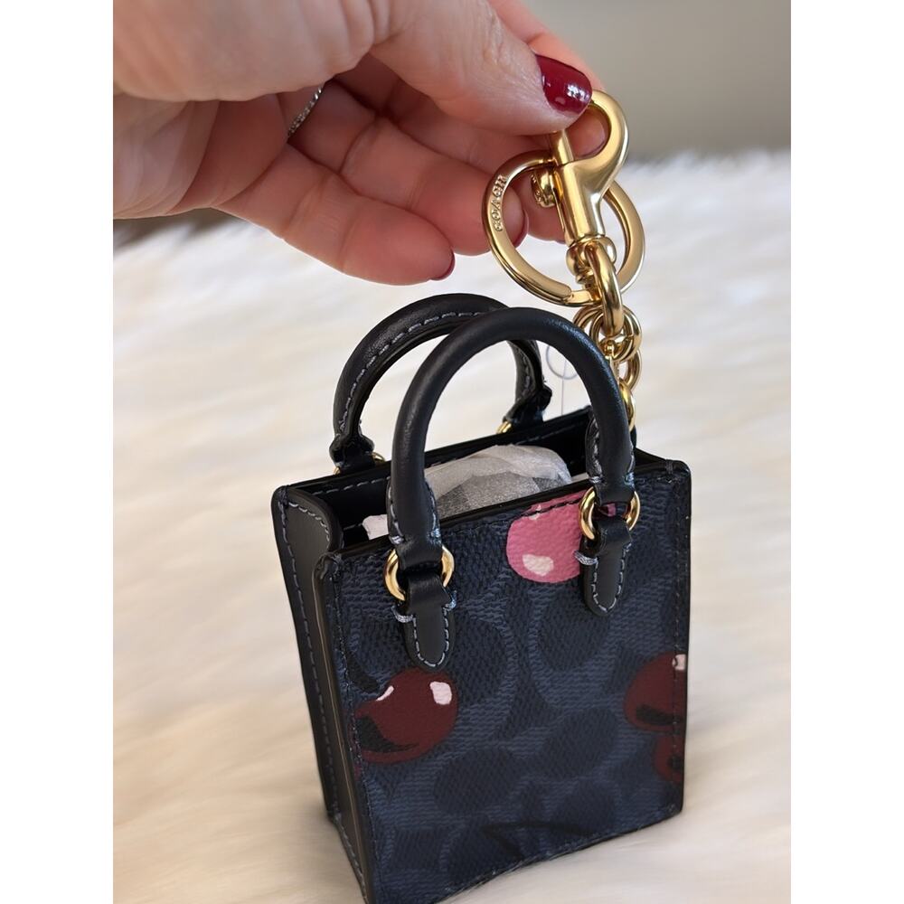 COACH North/South Mini Tote Bag Charm In Signature Canvas With Cherry Print - Picture 5 of 6